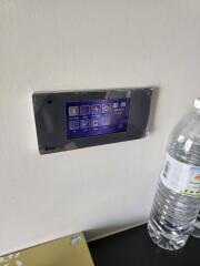 Modern digital control panel on wall