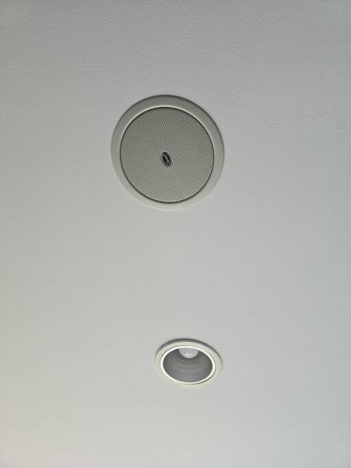 Ceiling with smoke detector and recessed lighting