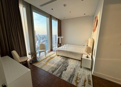 Bright and modern bedroom with city views