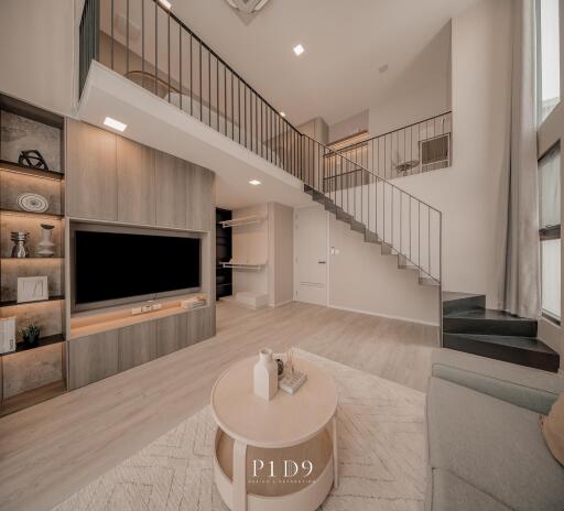 Spacious modern living room with mezzanine and elegant interior design