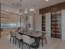 Modern dining room with open kitchen design and wine storage