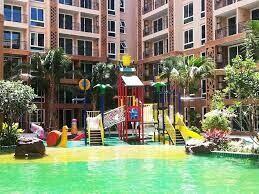 Colorful playground with vibrant greenery in a residential complex