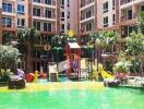 Colorful playground with vibrant greenery in a residential complex