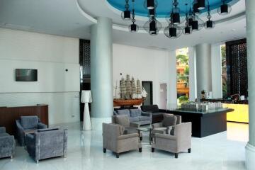 Spacious hotel lobby with contemporary design and luxurious seating arrangement