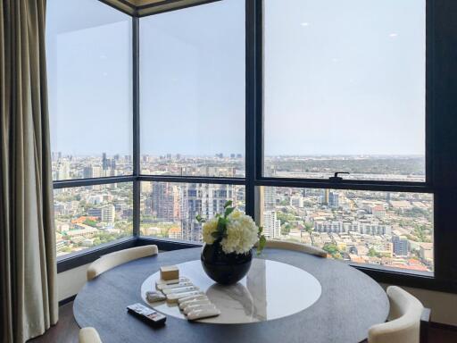 Spacious living area with panoramic city view