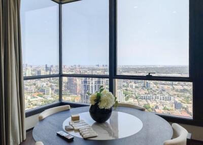 Spacious living area with panoramic city view