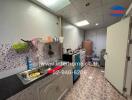 Interior kitchen with sink and storage cabinets