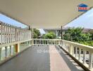 Spacious balcony with railing and residential view