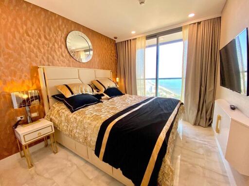 Elegant bedroom with modern decor and ocean view