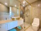 Modern bathroom with glass shower and sleek vanity