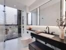 Modern spacious bathroom with large mirror and natural lighting