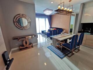 Elegant living room with modern dining setup and stylish decor