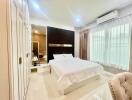 Modern and well-lit bedroom with stylish decor