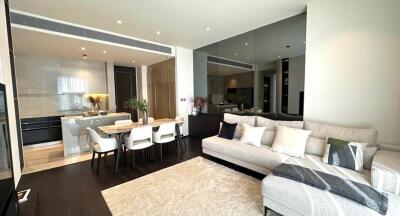 Spacious modern living room with kitchen and dining area