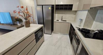Modern kitchen with sleek design and well-equipped appliances