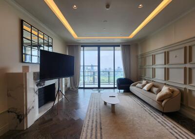 Spacious and modern living room with large windows and stylish decor