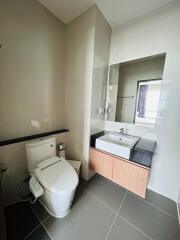 Modern bathroom with well-lit vanity area