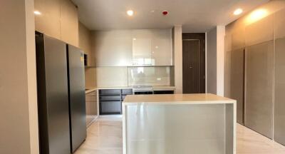 Modern kitchen with sleek appliances and ample cabinet space