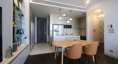 modern kitchen with dining area in contemporary apartment