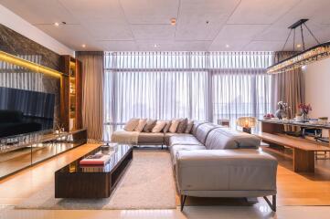 Spacious and elegantly furnished living room with ample natural light