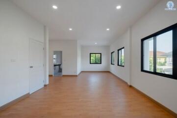 Spacious and bright living room with large windows