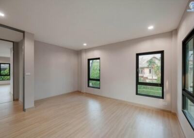 Spacious and well-lit living room with large windows