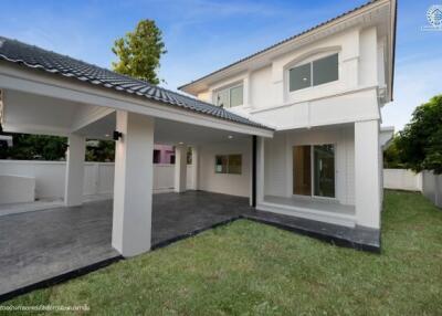 Modern two-story house with an attached carport