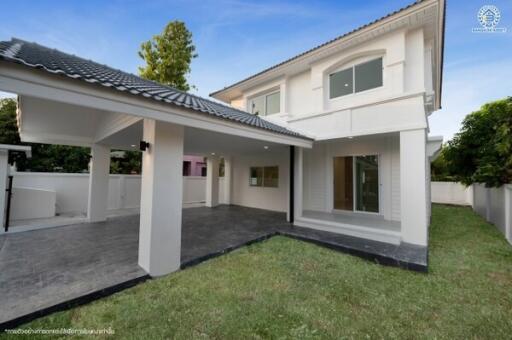 Modern two-story house with an attached carport