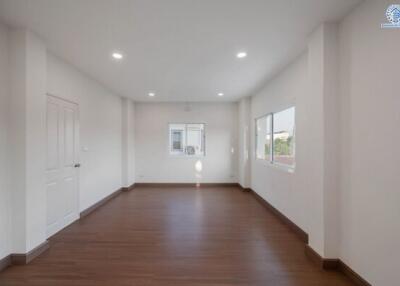 Spacious modern bedroom with ample natural light