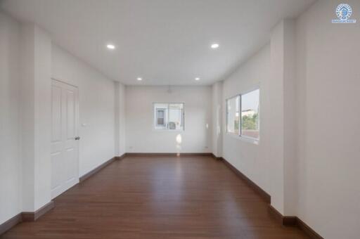 Spacious modern bedroom with ample natural light