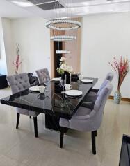 Elegant dining room with modern furniture and decorative lighting