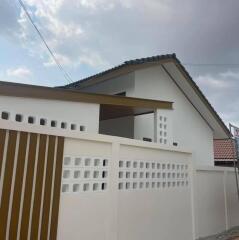 Modern single-family house exterior with stylish gate