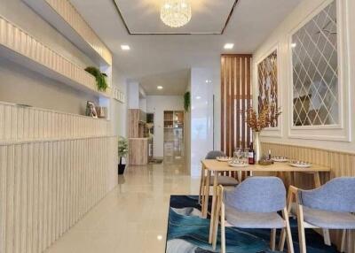 Elegant dining room with modern decor and stylish lighting