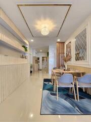 Elegant dining room with modern decor and stylish lighting