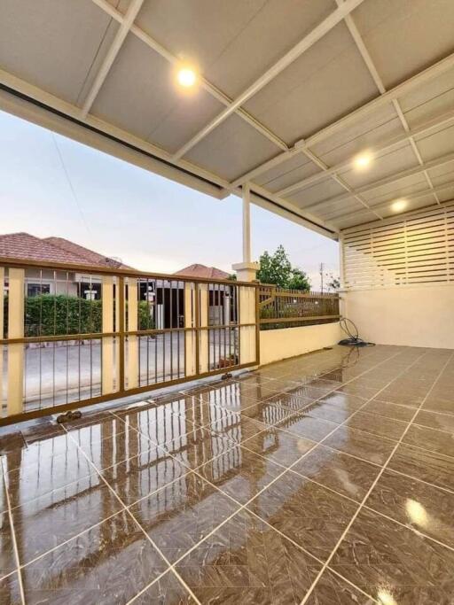 Spacious balcony with ceramic flooring and scenic view