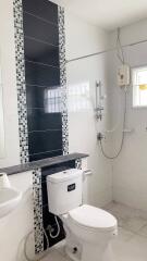 Modern bathroom with shower and toilet facilities