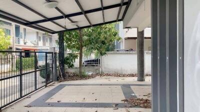 Spacious covered patio area with view of surrounding neighborhood