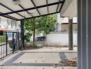 Spacious covered patio area with view of surrounding neighborhood