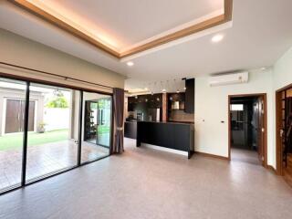 Spacious open-plan living room and kitchen with modern finishes