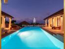 Luxurious outdoor pool area of a residential estate at twilight with illuminated pool and villa