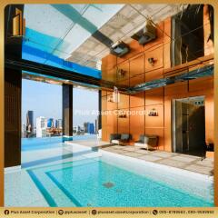 Luxurious indoor pool with panoramic city views