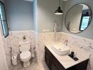 Elegantly designed modern bathroom with geometric floor tiles and stylish fixtures