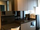 Modern kitchen with integrated appliances and sleek cabinetry