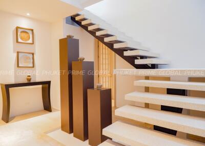 Modern staircase in a contemporary home interior with artistic decor