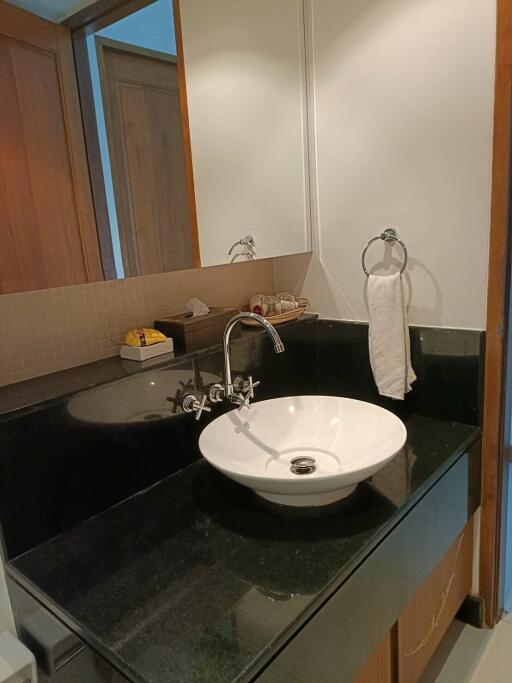Modern bathroom with sleek countertop and stylish sink