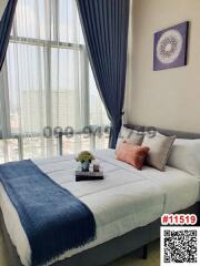Cozy bedroom with city view