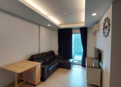 Modern living room with comfortable leather sofa and stylish lighting