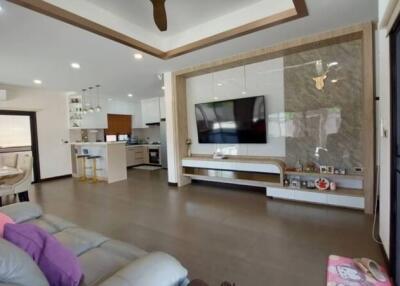Spacious and modern open plan living room with kitchen