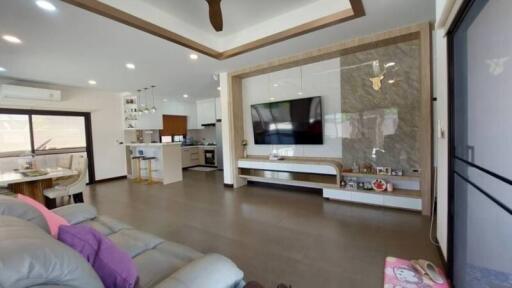 Spacious and modern open plan living room with kitchen