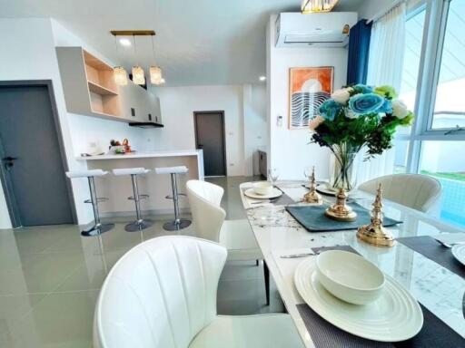 Modern kitchen with dining area and elegant decorations